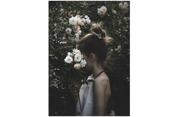 Girl with flowers. 1 flower girl